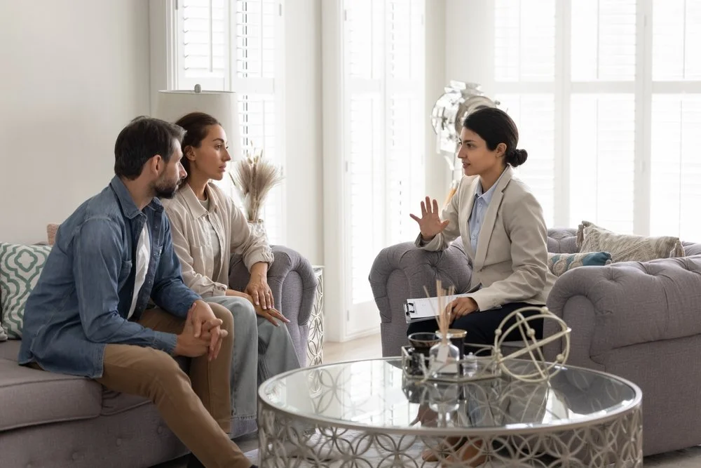 Couple talking therapist