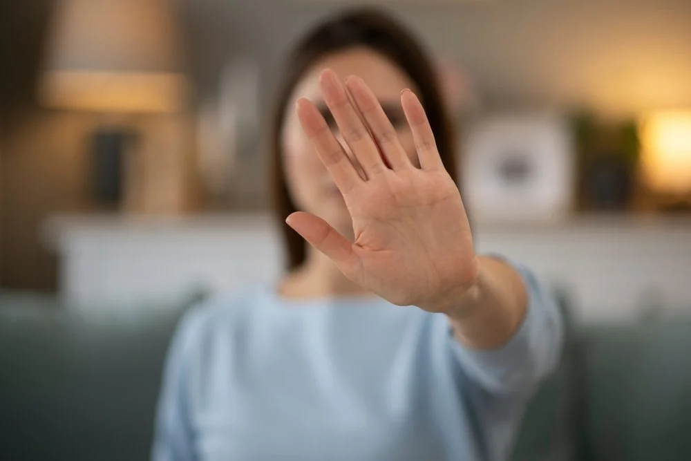 Woman showing palm of hand